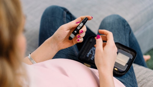 A pregnant woman testing for Gestational diabetes